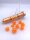 Würfelset: 7 Würfel mehrseitig Transculent Neon Orange/white (LAB DICE Serie 7)